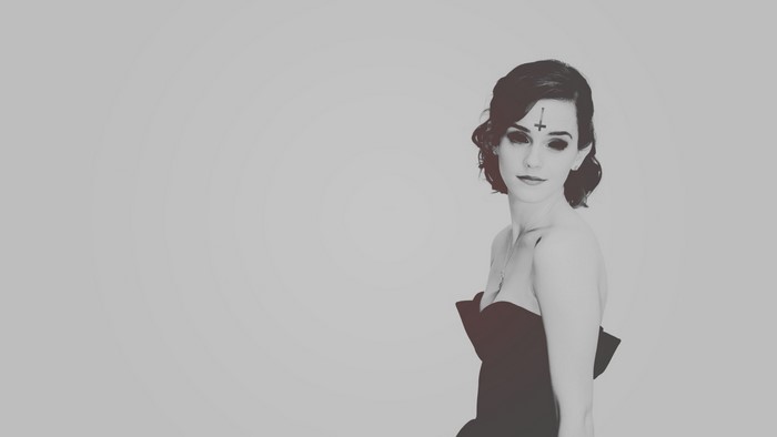 Emma Watson with inverted cross on forehead