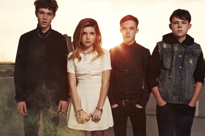 Echosmith band members posing outdoors