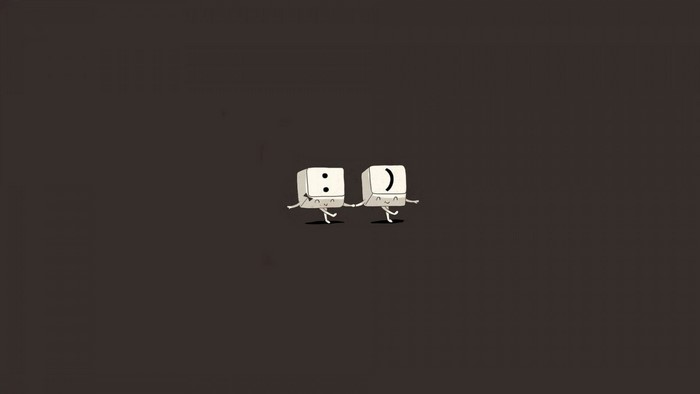 Two keyboard keys with emoticons dancing