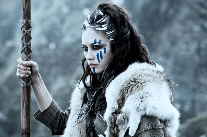 Olga Kurylenko as a warrior with face paint