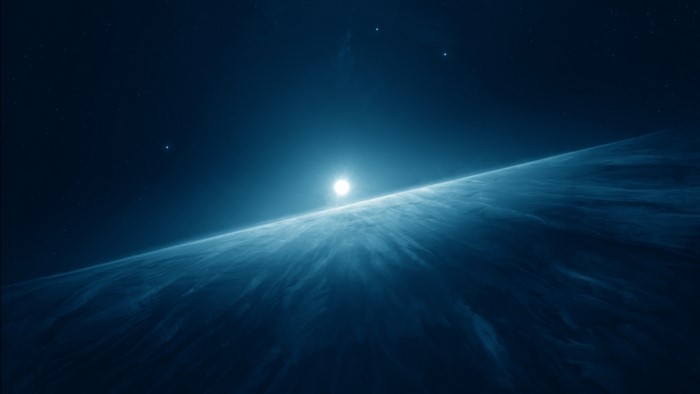 Sunlight over a planet's atmosphere in outer space