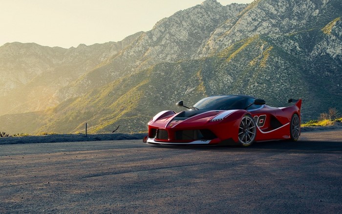 Red Ferrari FXX K Evo parked on a mountain road