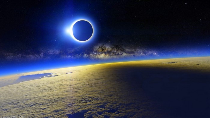 Solar eclipse over Earth's atmosphere with Milky Way galaxy