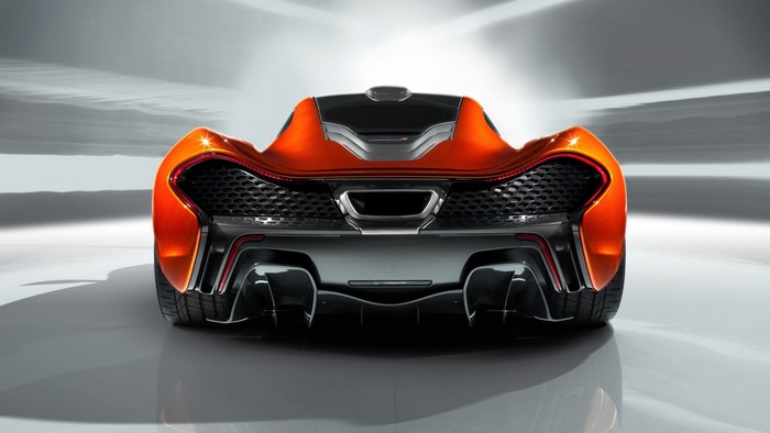 Rear view of an orange McLaren P1 sports car