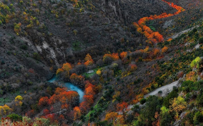 Autumn River Valley in Mountainous Terrain