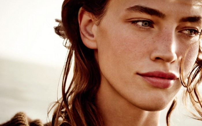 Crista Cober portrait with freckles and brown hair