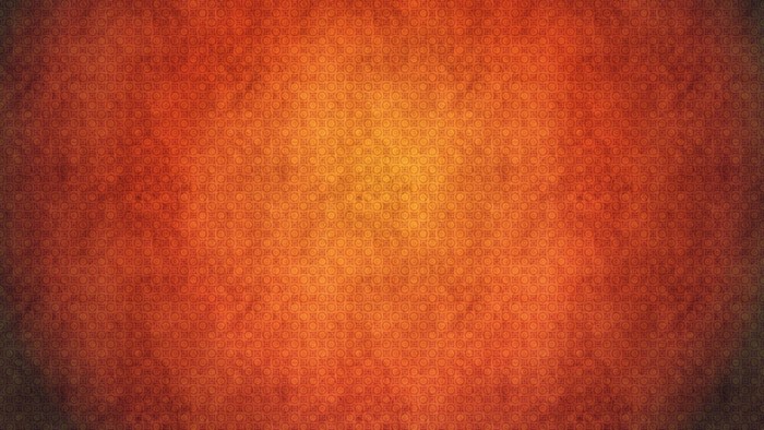 Orange and yellow textured pattern with circles