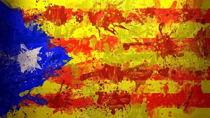 Catalan flag painted with abstract splashes of color