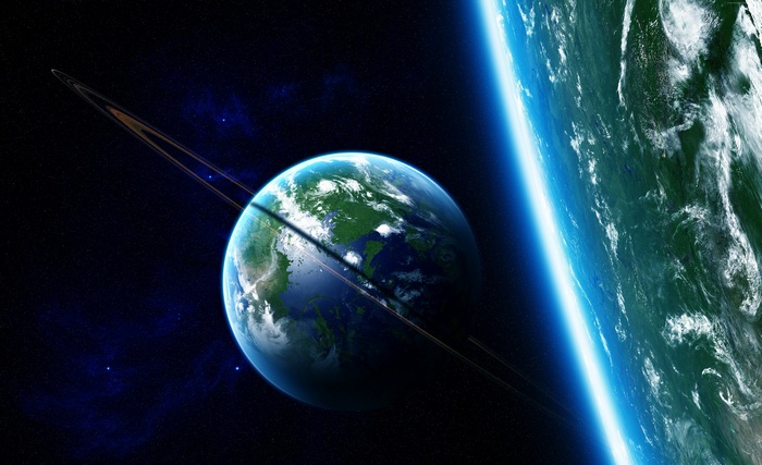 Planet with rings in outer space with stars