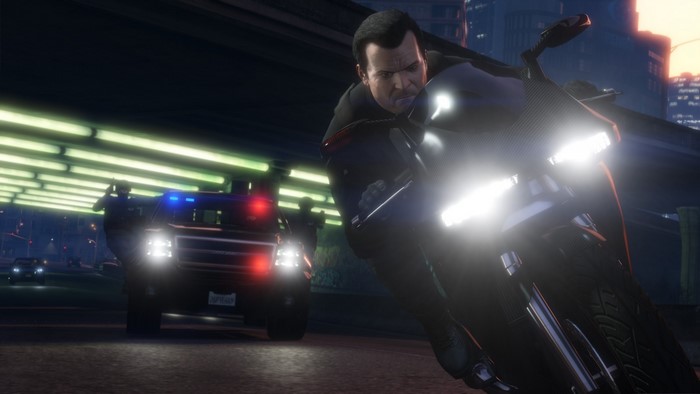 Man on motorcycle pursued by police in Grand Theft Auto V