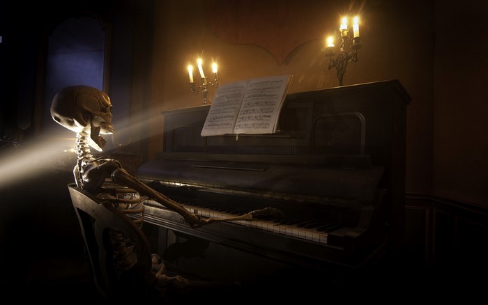 Skeleton playing piano with candles and sun rays