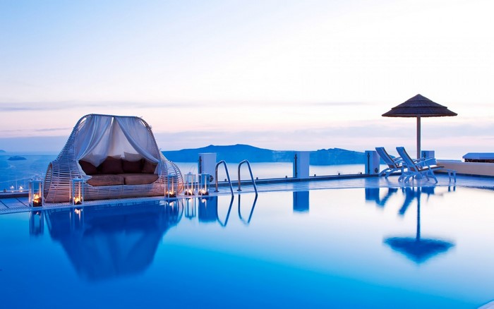 Infinity pool overlooking the sea at dusk