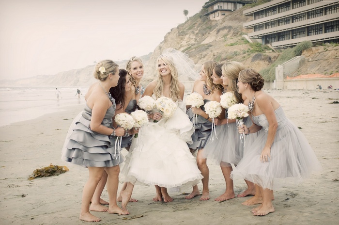 Bride and bridesmaids on a beach