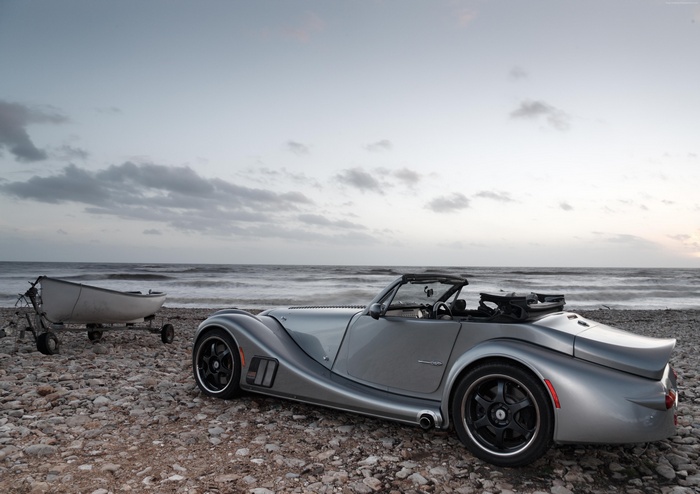 Grey Morgan Aero 8 convertible sports car on a beach