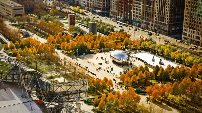 Cloud Gate sculpture in Millennium Park, Chicago during autumn