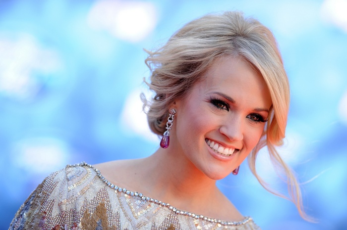Carrie Underwood smiling at an event
