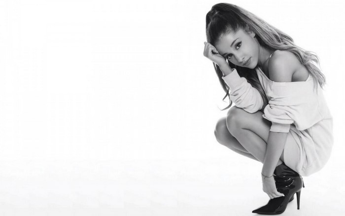 Ariana Grande posing in a studio