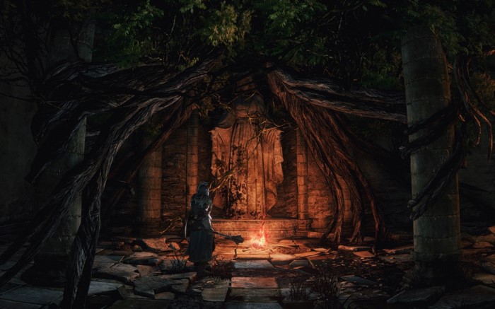 Dark Souls II screenshot of a character near a statue