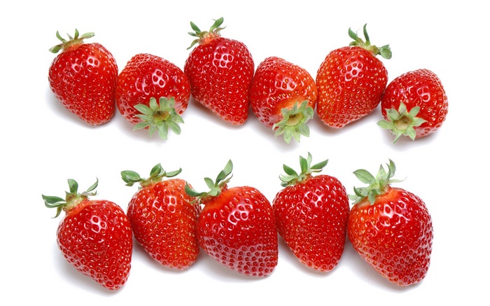 Ten strawberries arranged in two rows