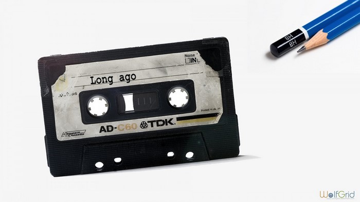 Cassette tape labeled "Long ago" with pencils
