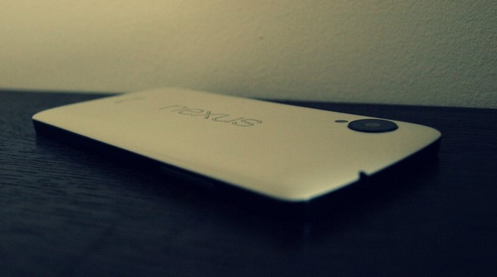 Nexus 5 smartphone on a dark surface