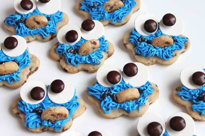 Cookie Monster cookies with blue frosting and chocolate chip