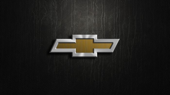 Chevrolet logo on a black textured background