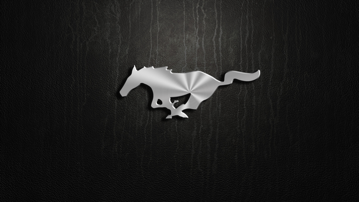Ford Mustang logo on black textured background