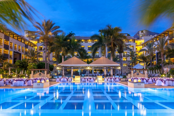 Costa Adeje Gran Hotel resort with swimming pool and dining setup
