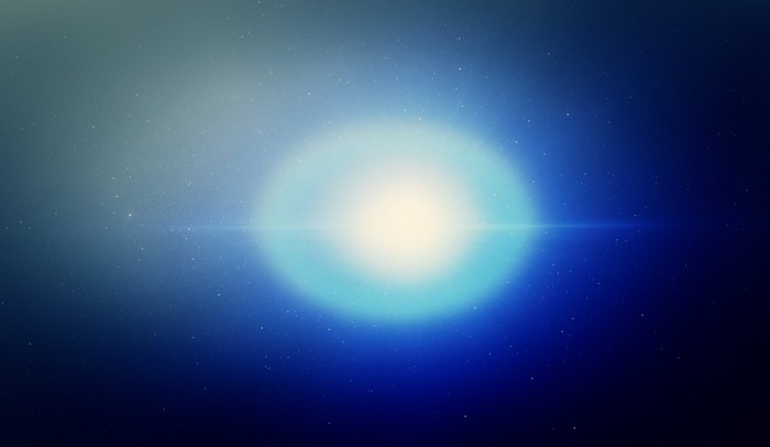 Bright light in deep blue space with stars