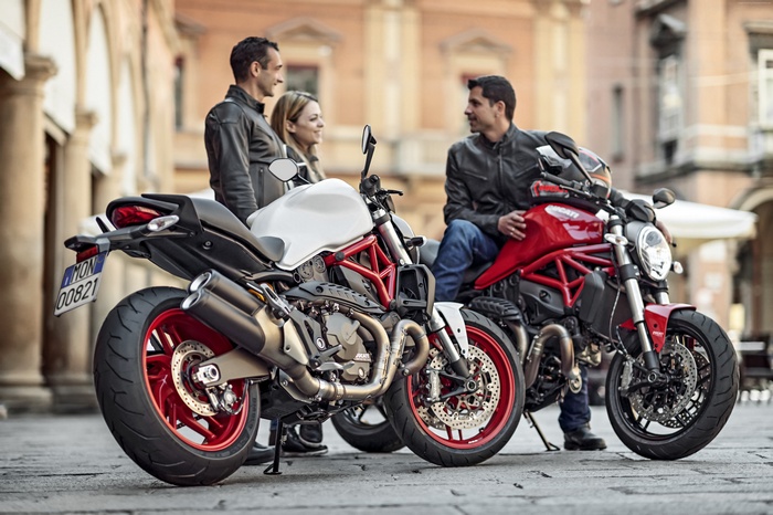 Ducati Monster 1200S motorcycles with riders