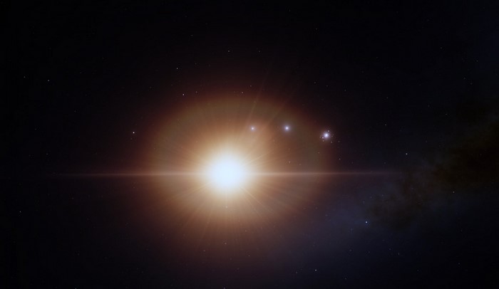 Bright star with planets in outer space