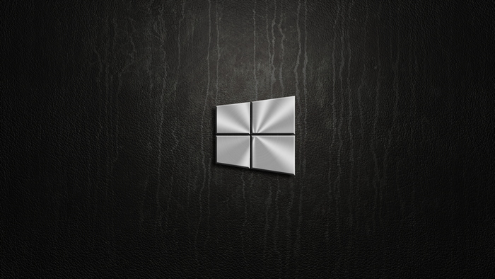 Windows logo on black textured background