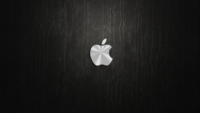 Apple logo on black textured background