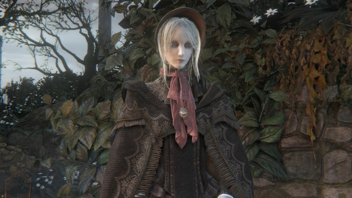Female character from Bloodborne in ornate clothing