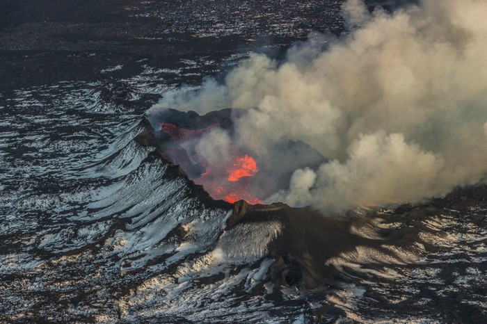 Volcanic eruption with lava and smoke in Iceland