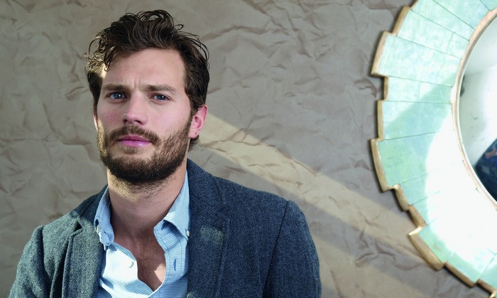 Jamie Dornan in a grey jacket
