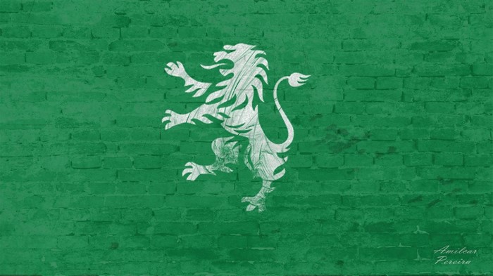 White lion illustration on green brick wall