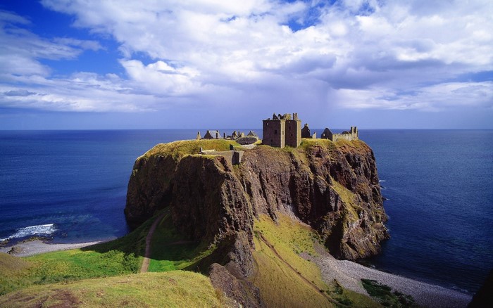 Dunnottar Castle ruins on a rocky cliff overlooking the sea