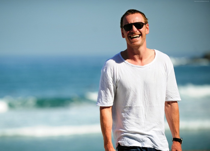 Michael Fassbender on a beach