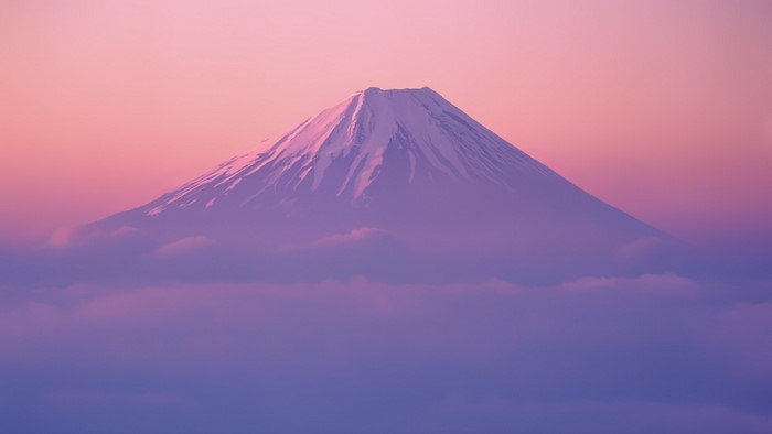 Mount Fuji at sunrise with clouds