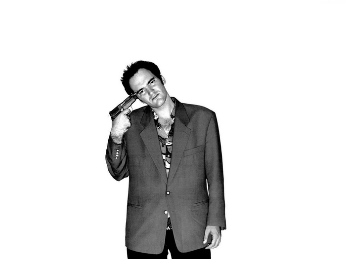 Quentin Tarantino holding a gun to his head