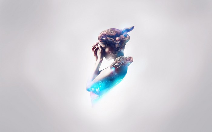 Statue with galaxy overlay and blue light