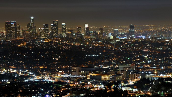 Night cityscape of Los Angeles with illuminated skyscrapers