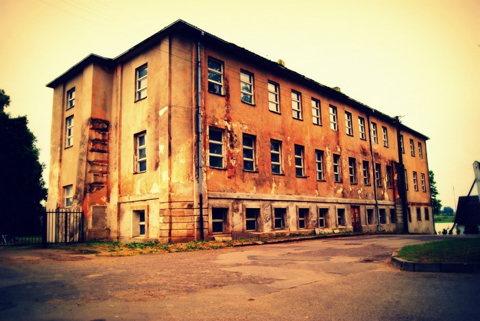 Dilapidated building with many windows