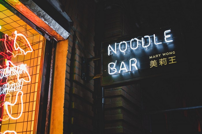 Neon Noodle Bar Sign at Night