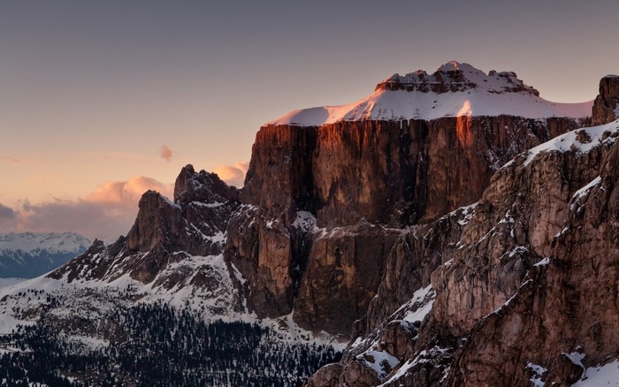 Snow-capped mountains at sunset in the Alps