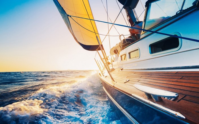 Luxury Sailing Yacht on Open Sea at Sunset
