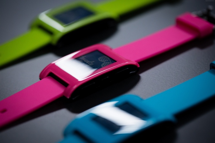 Three Pebble Smartwatches in different colors