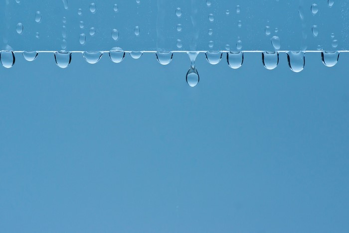 Water drops on a blue background